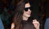 Anne Hathaway Proves Every Summer Slip Dress Needs High-Contrast Sneakers and No-Show Socks