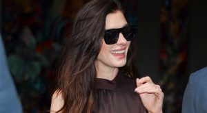 Anne Hathaway Proves Every Summer Slip Dress Needs High-Contrast Sneakers and No-Show Socks