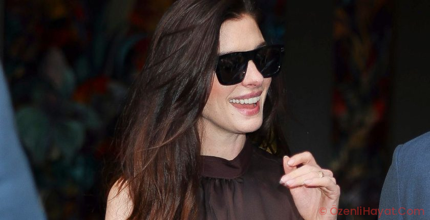 Anne Hathaway Proves Every Summer Slip Dress Needs High-Contrast Sneakers and No-Show Socks
