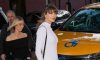 Taylor Swift Demonstrates the Easiest Way to Elevate a Ponytail This Summer